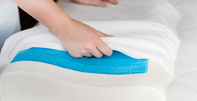 Use a cooling mattress pad or topper