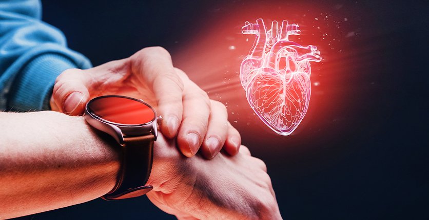 Close up of person checking heart monitor on watch