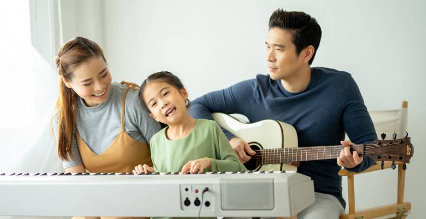 Family making music together