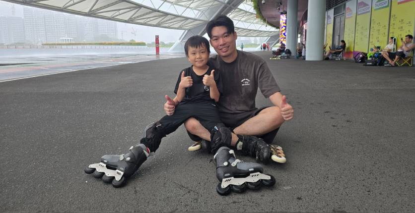 Ernest Wong with one student